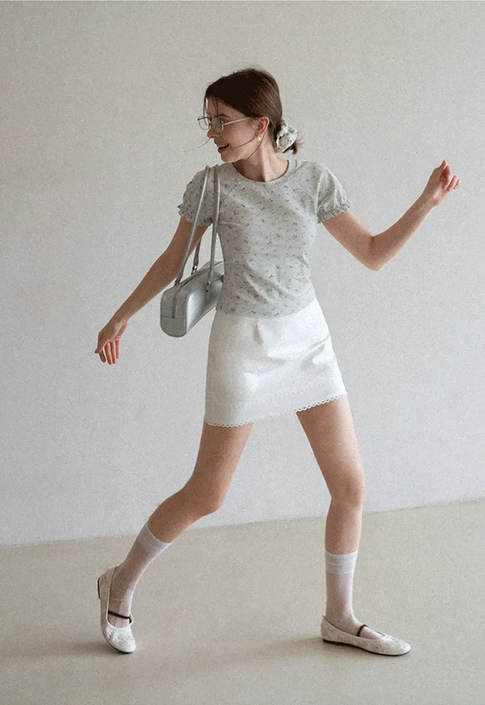 Mini skirt with lace trim at waist and hem