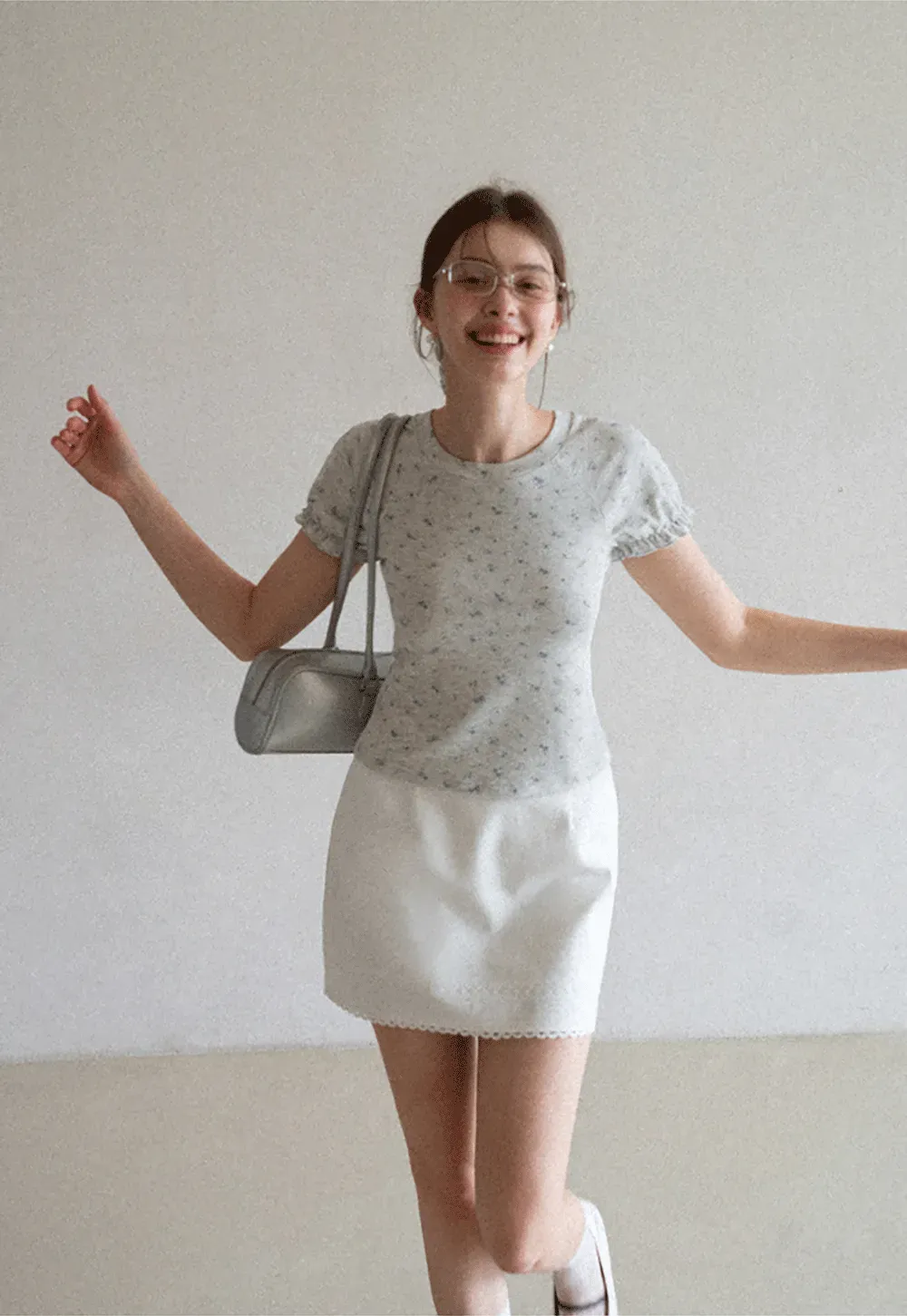 Mini skirt with lace trim at waist and hem