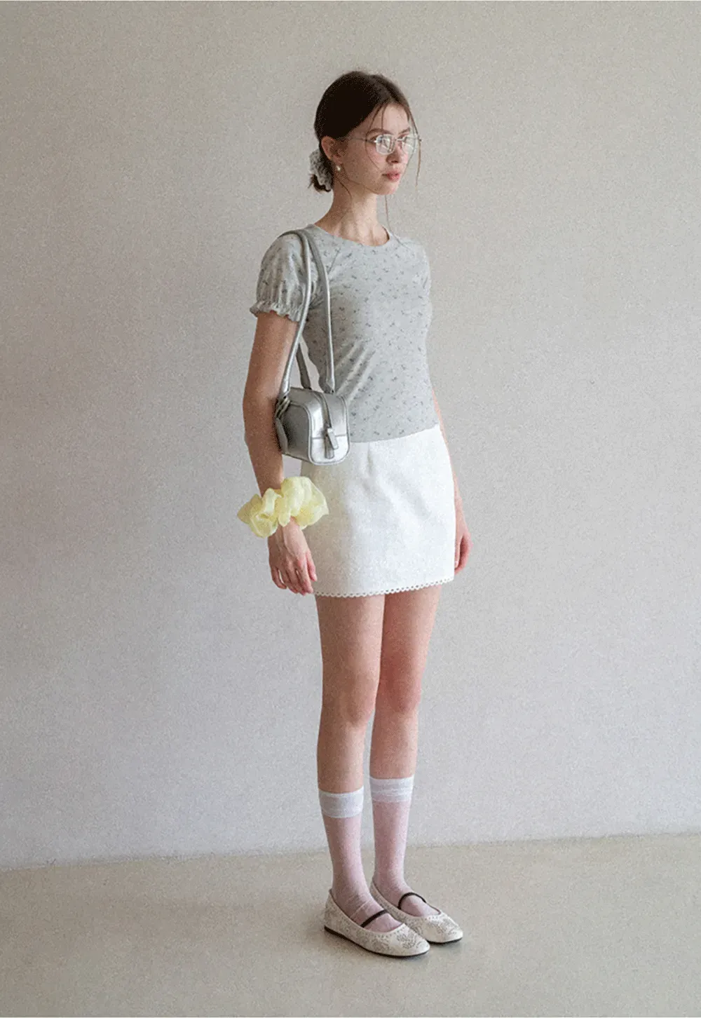 Mini skirt with lace trim at waist and hem