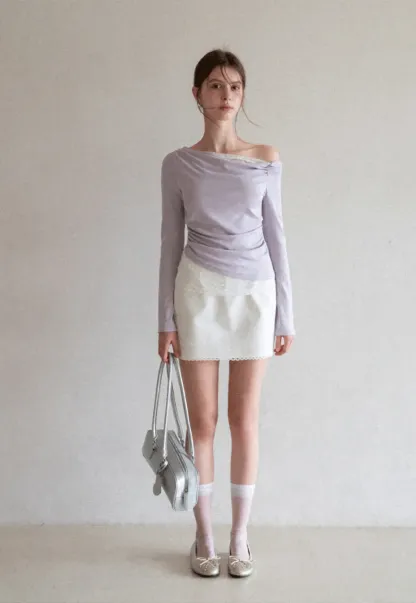 Mini skirt with lace trim at waist and hem