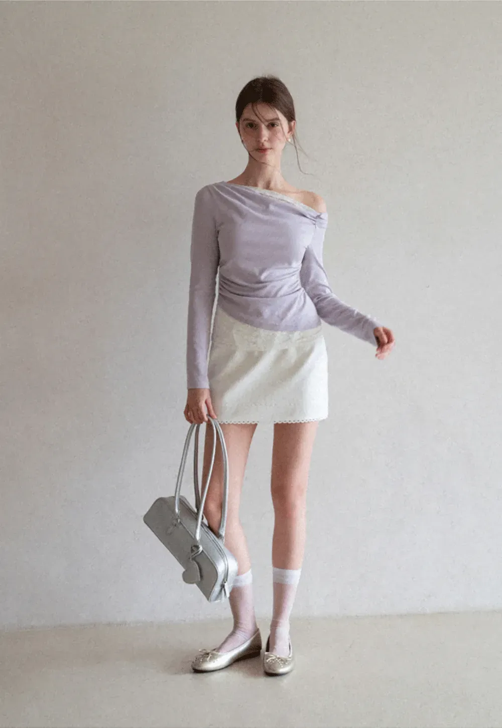 Mini skirt with lace trim at waist and hem