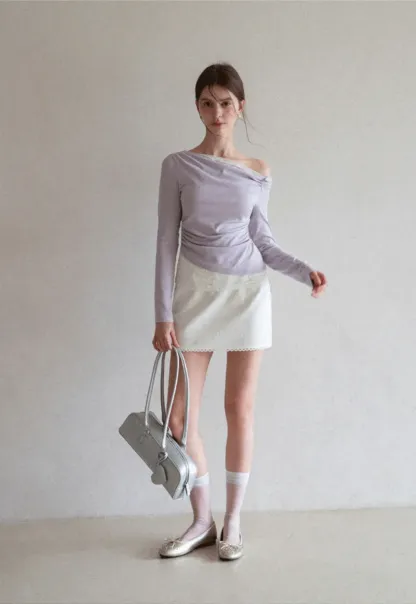 Mini skirt with lace trim at waist and hem