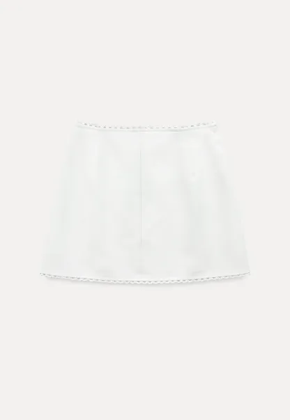 Mini skirt with lace trim at waist and hem