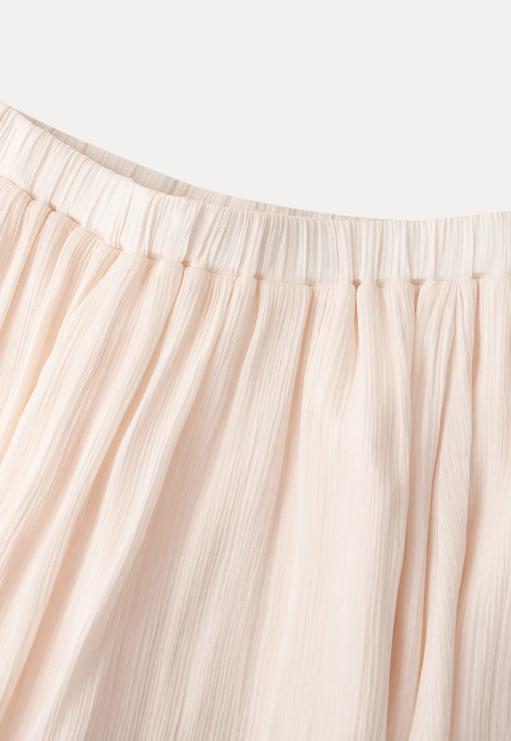 Pleated Asymmetrical Hem Skirt