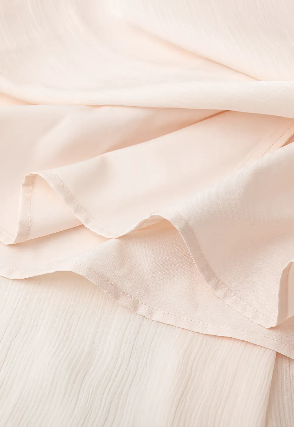 Pleated Asymmetrical Hem Skirt