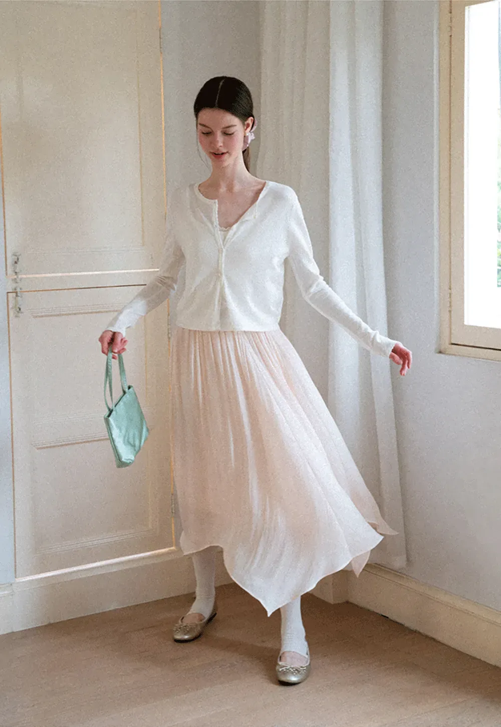 Pleated Asymmetrical Hem Skirt