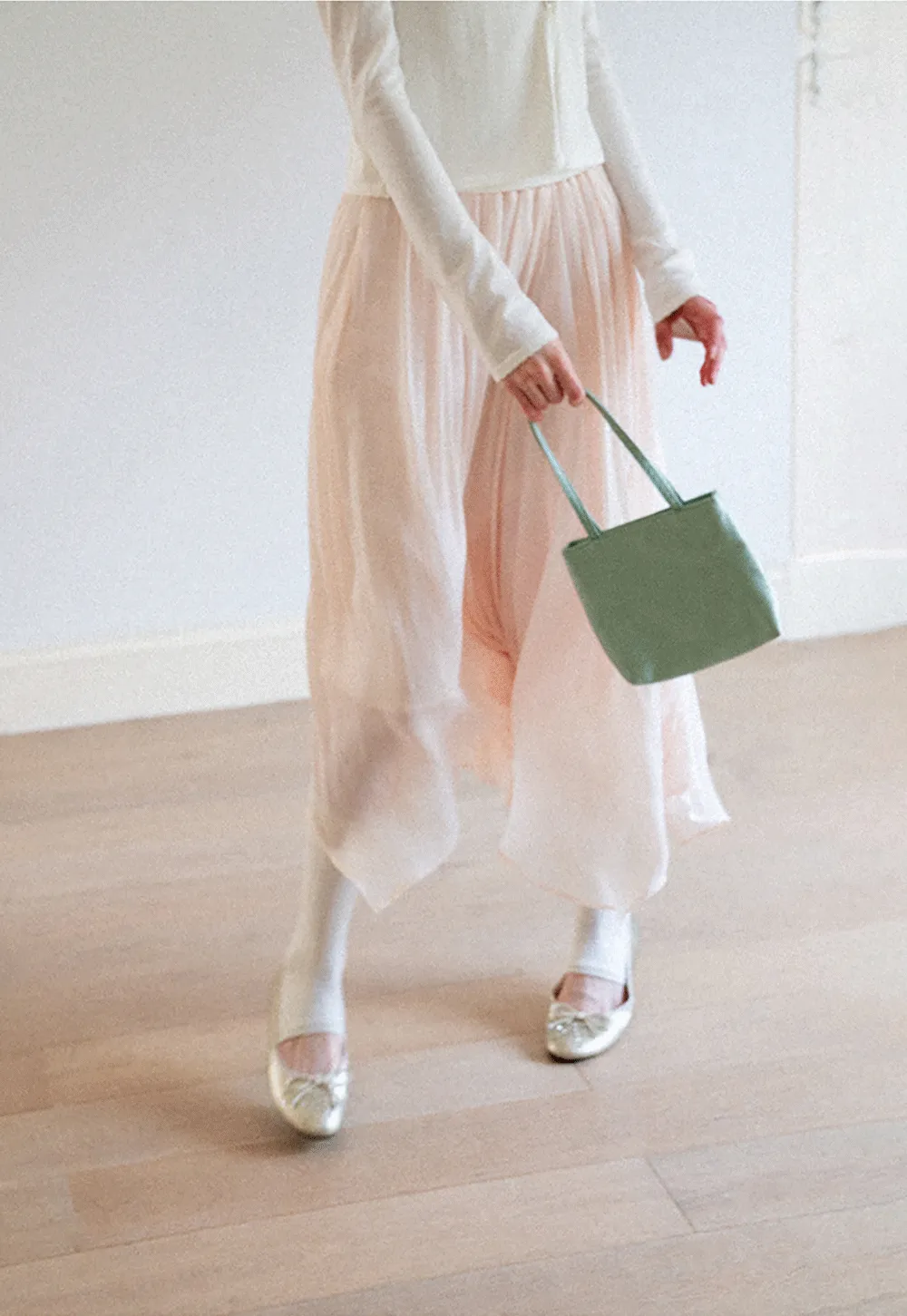 Pleated Asymmetrical Hem Skirt