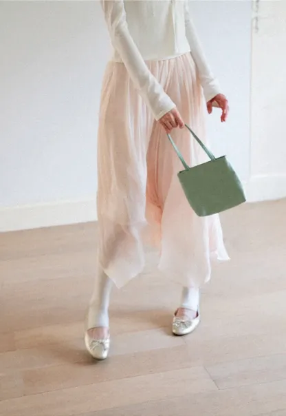 Pleated Asymmetrical Hem Skirt