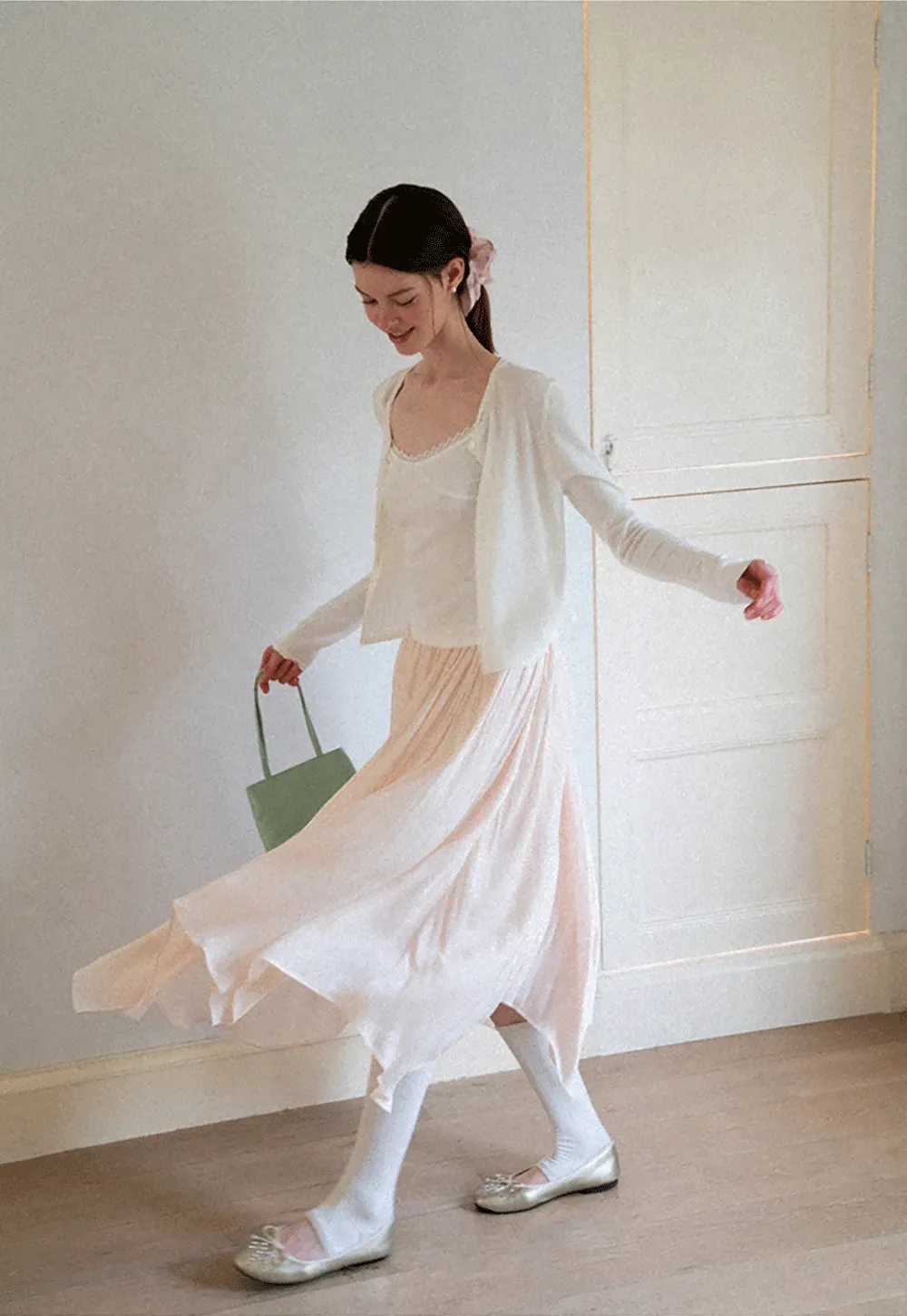 Pleated Asymmetrical Hem Skirt