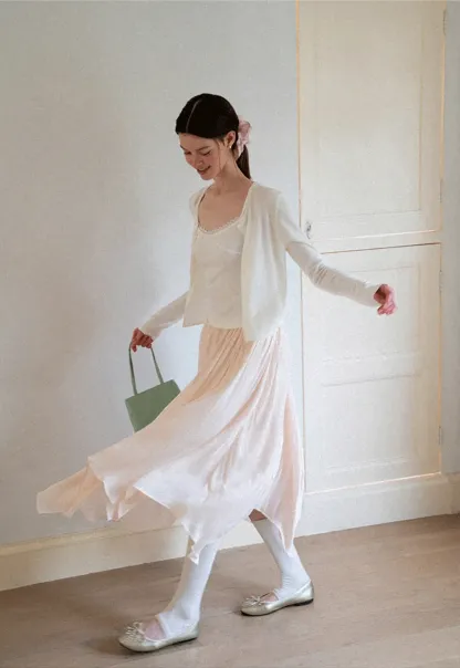 Pleated Asymmetrical Hem Skirt