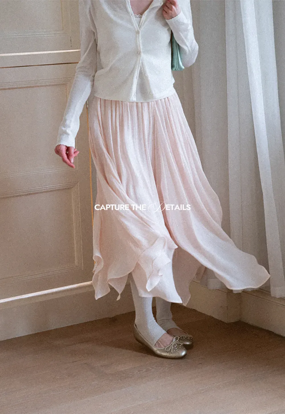 Pleated Asymmetrical Hem Skirt