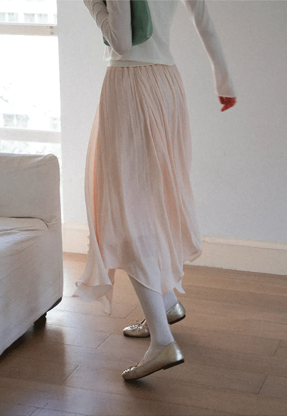 Pleated Asymmetrical Hem Skirt
