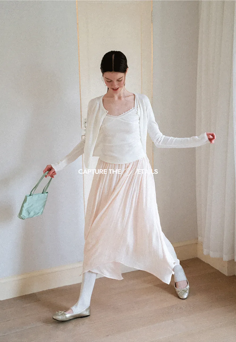 Pleated Asymmetrical Hem Skirt