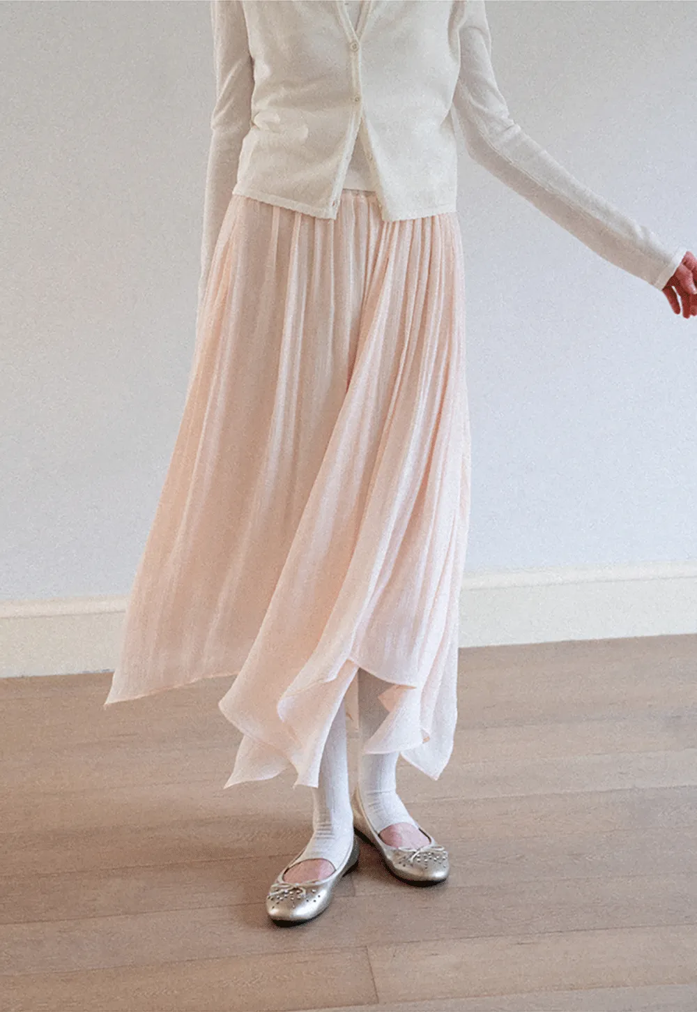 Pleated Asymmetrical Hem Skirt