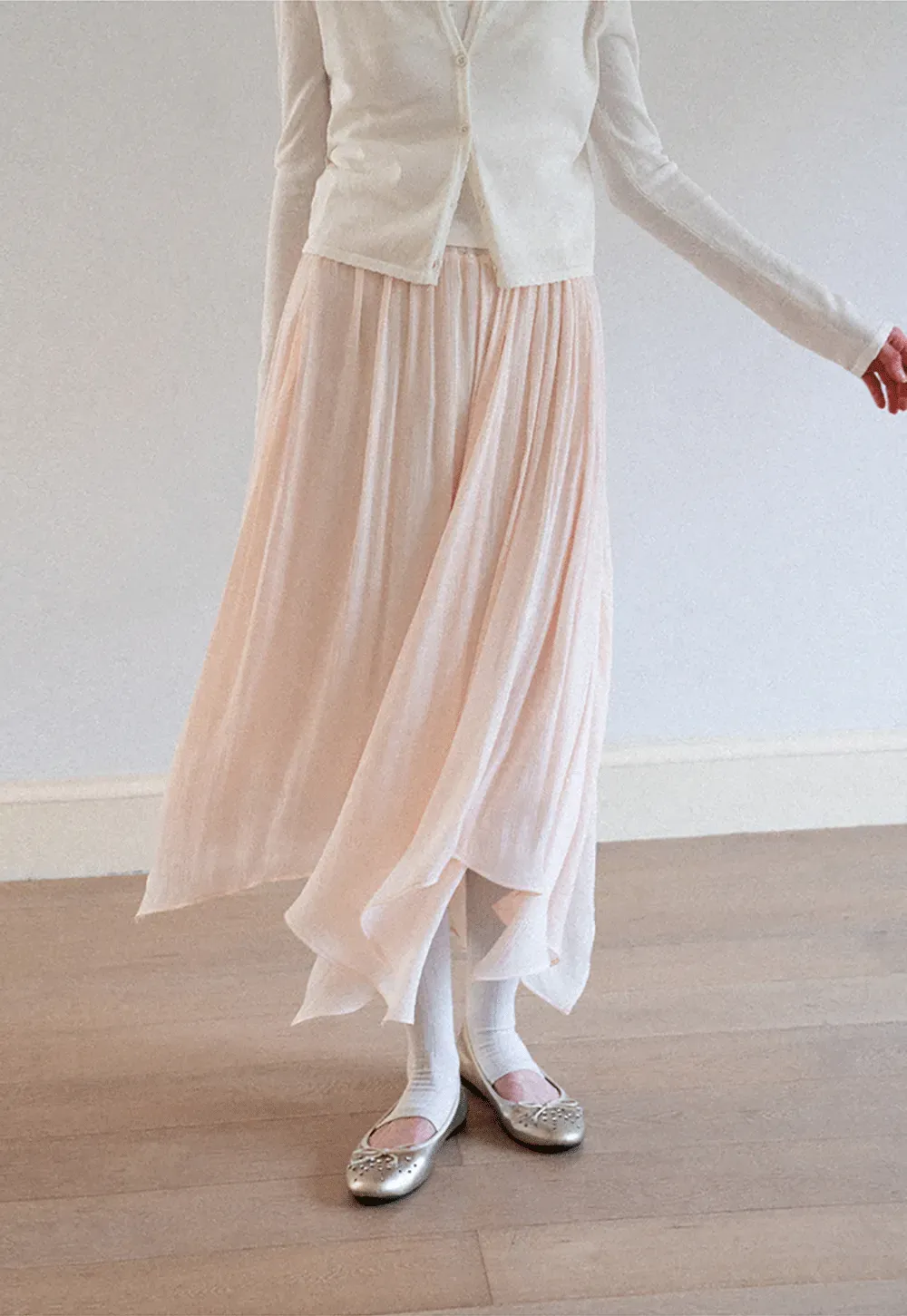 Pleated Asymmetrical Hem Skirt