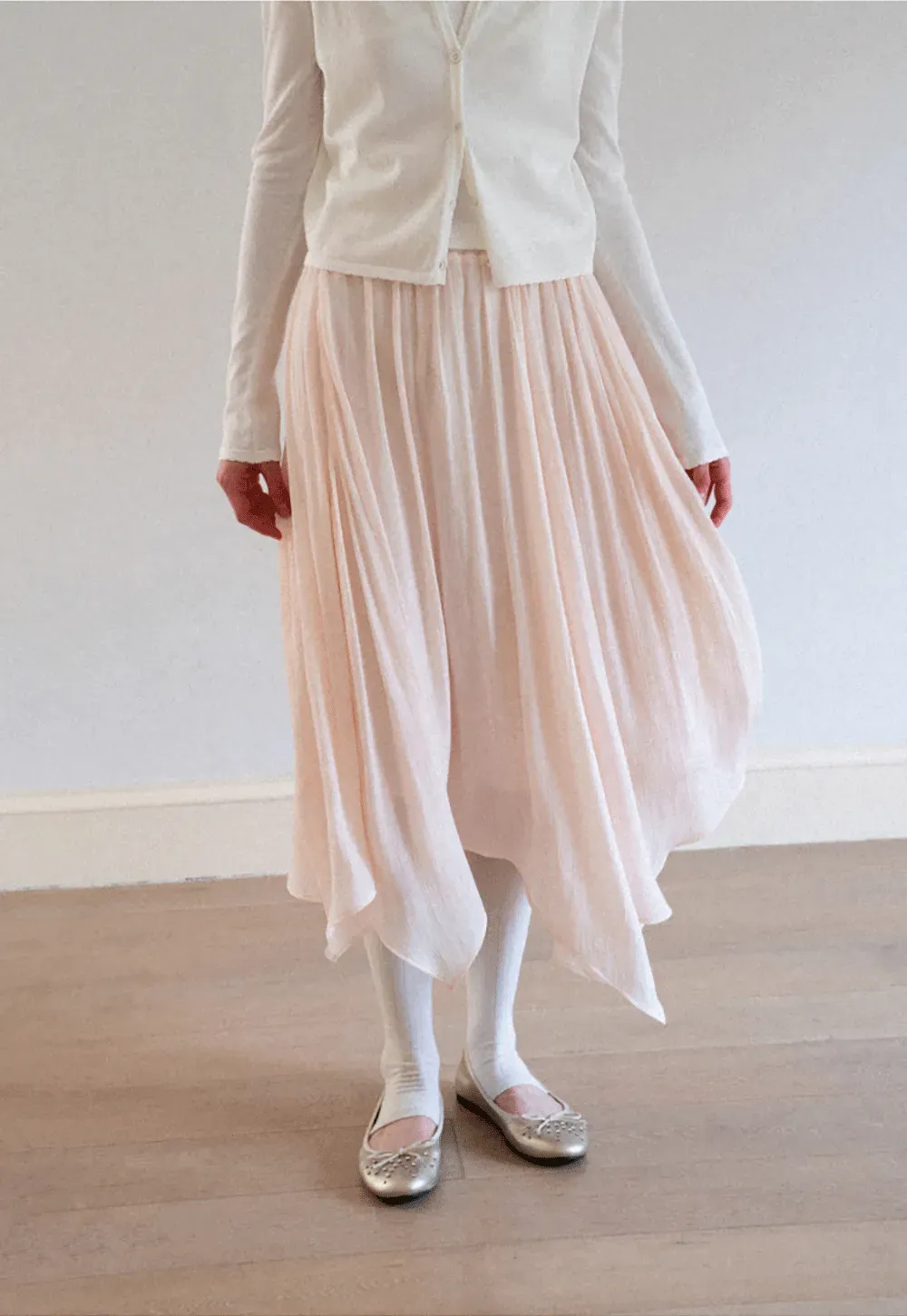 Pleated Asymmetrical Hem Skirt