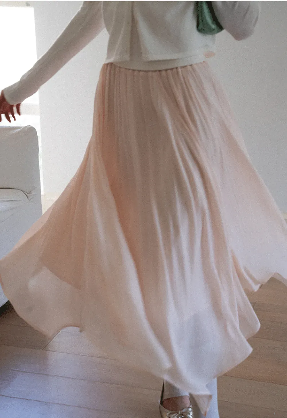 Pleated Asymmetrical Hem Skirt