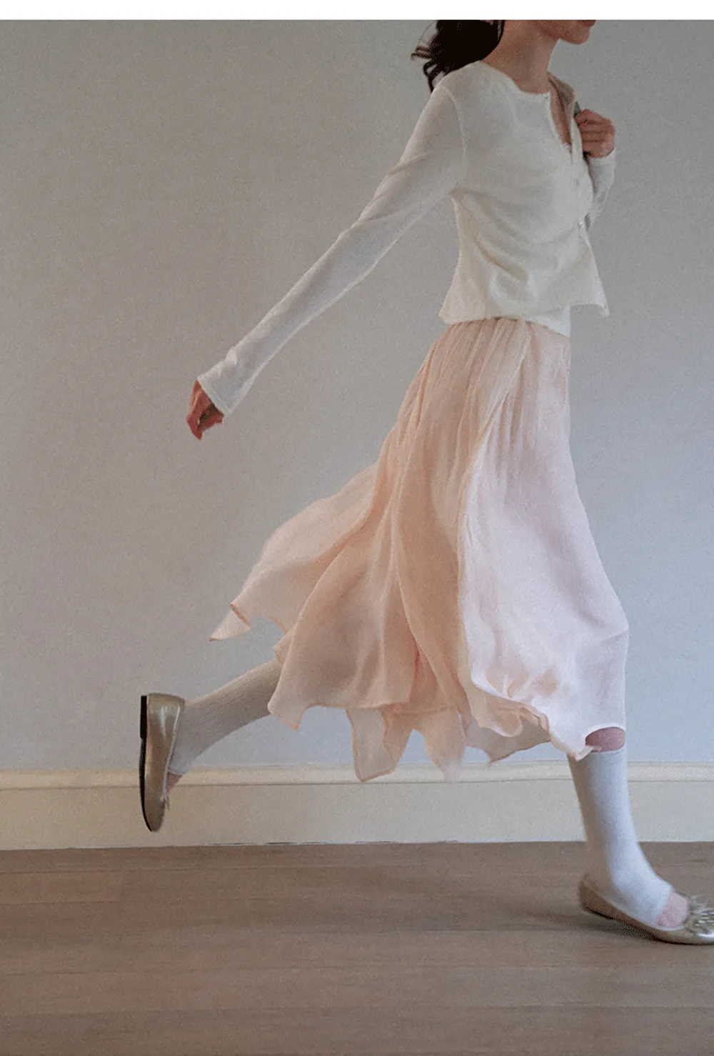 Pleated Asymmetrical Hem Skirt