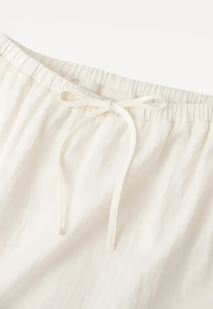 Linen skirt with drawstring waist and ruffled hem