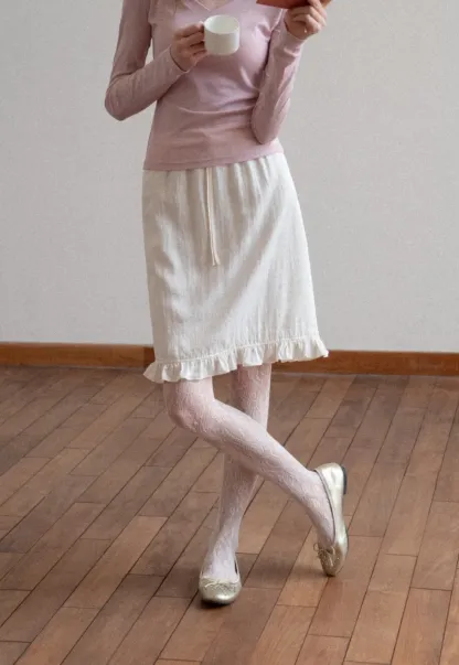 Linen skirt with drawstring waist and ruffled hem