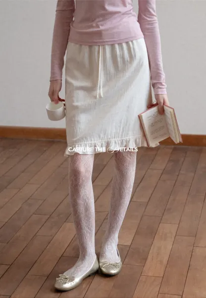 Linen skirt with drawstring waist and ruffled hem