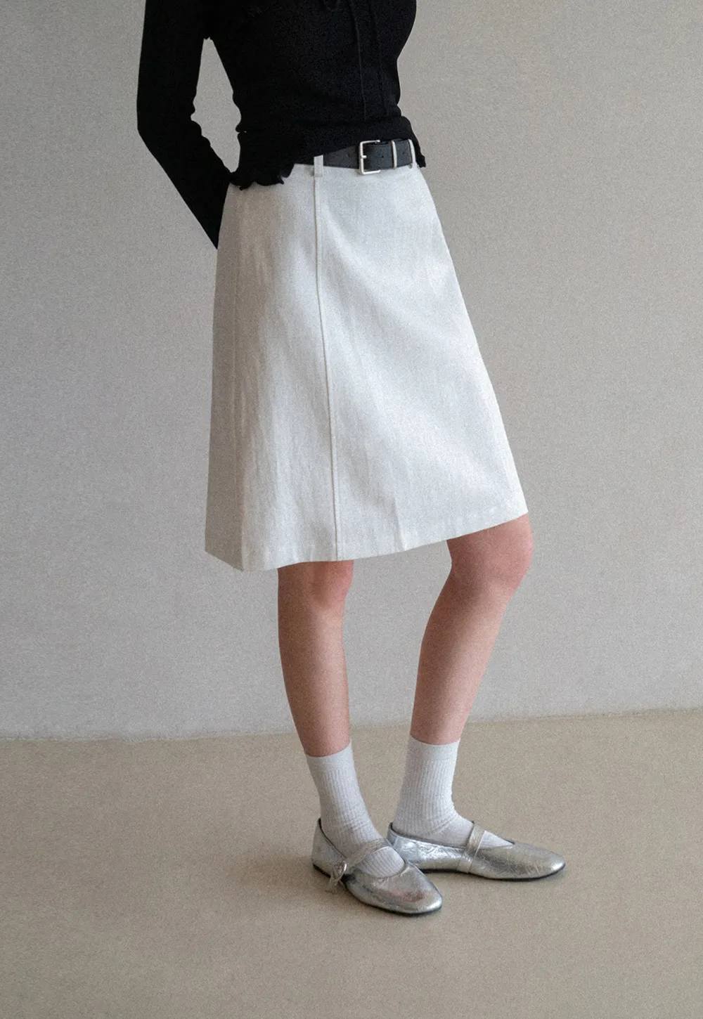 A-line knee length skirt with front seam and belt loop