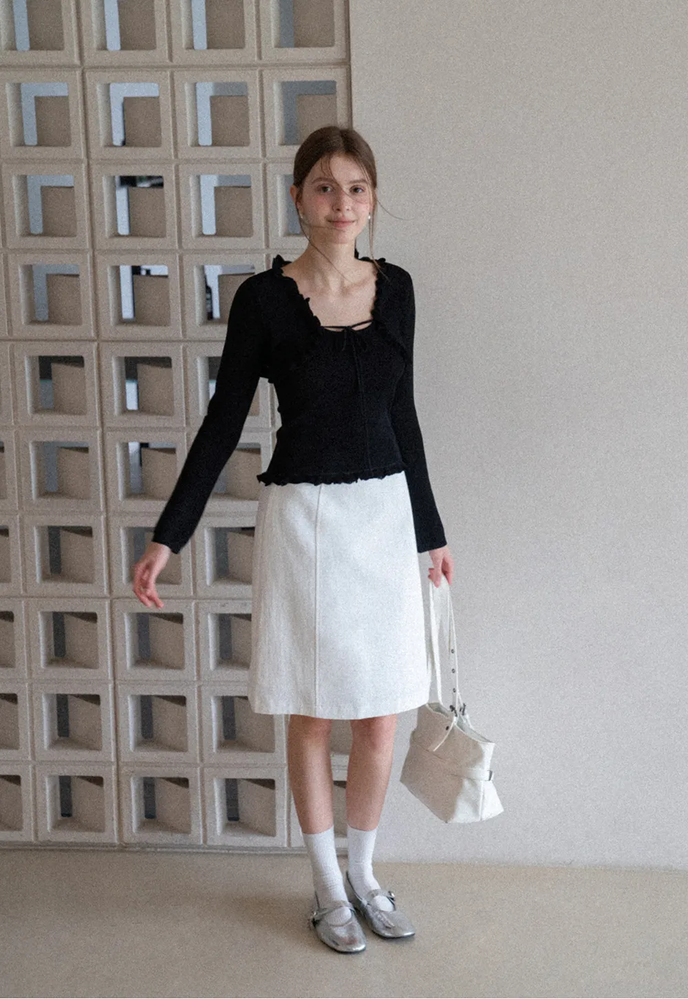 A-line knee length skirt with front seam and belt loop