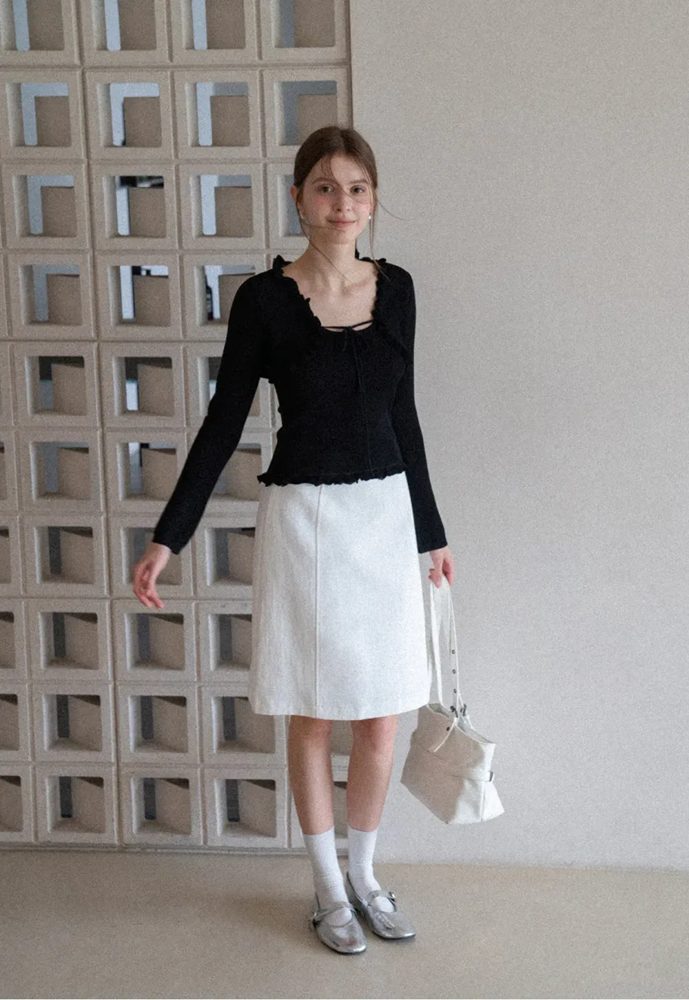 A-line knee length skirt with front seam and belt loop
