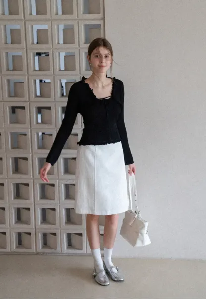 A-line knee length skirt with front seam and belt loop
