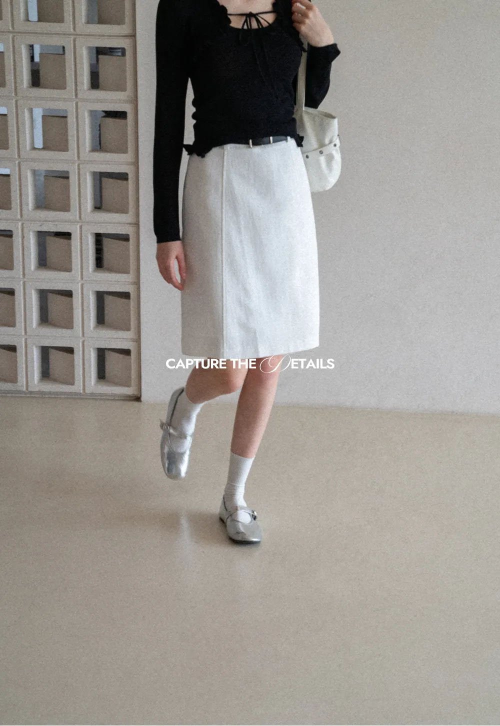 A-line knee length skirt with front seam and belt loop