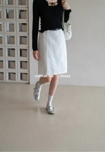 A-line knee length skirt with front seam and belt loop