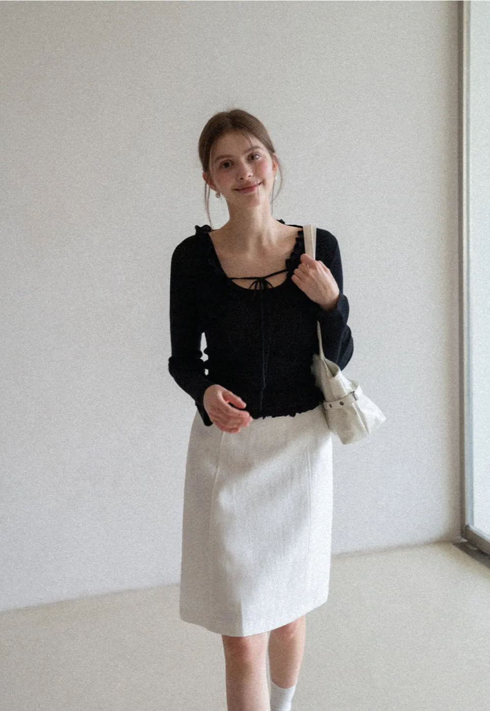 A-line knee length skirt with front seam and belt loop