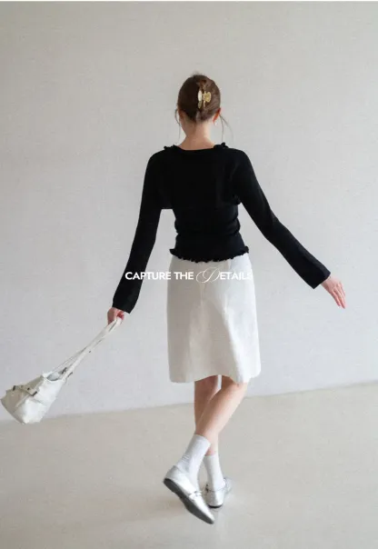 A-line knee length skirt with front seam and belt loop