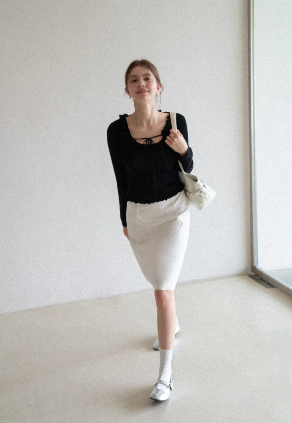 A-line knee length skirt with front seam and belt loop