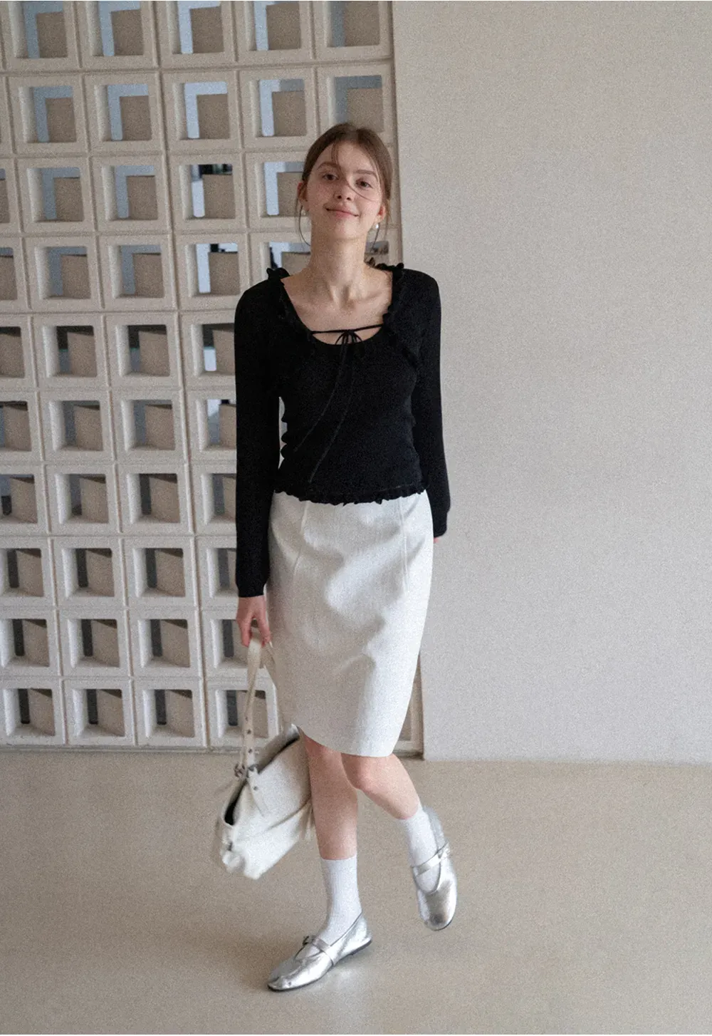 A-line knee length skirt with front seam and belt loop