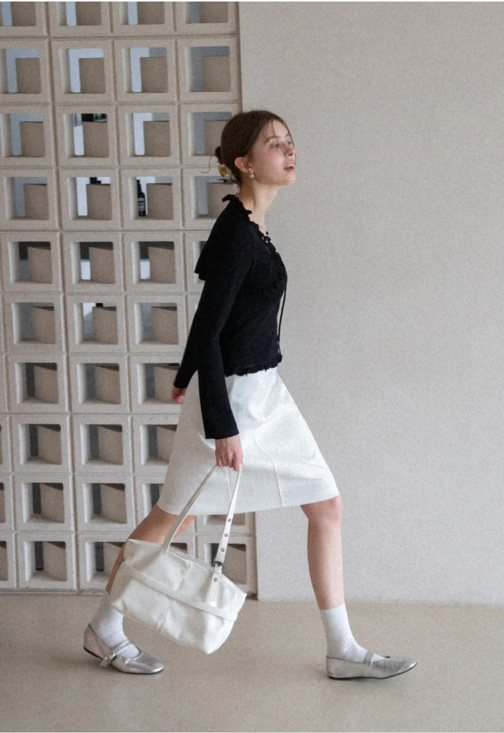 A-line knee length skirt with front seam and belt loop