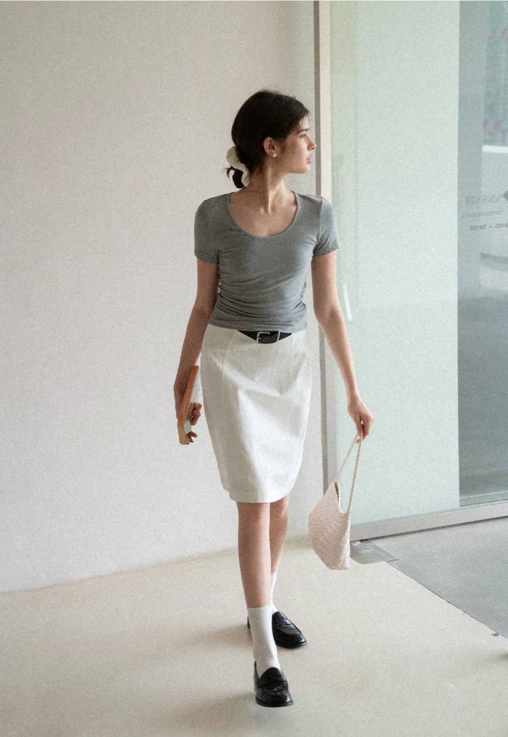 A-line knee length skirt with front seam and belt loop