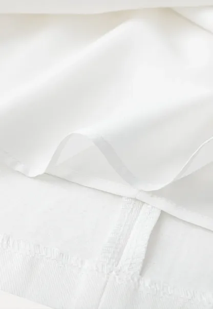 A-line knee length skirt with front seam and belt loop