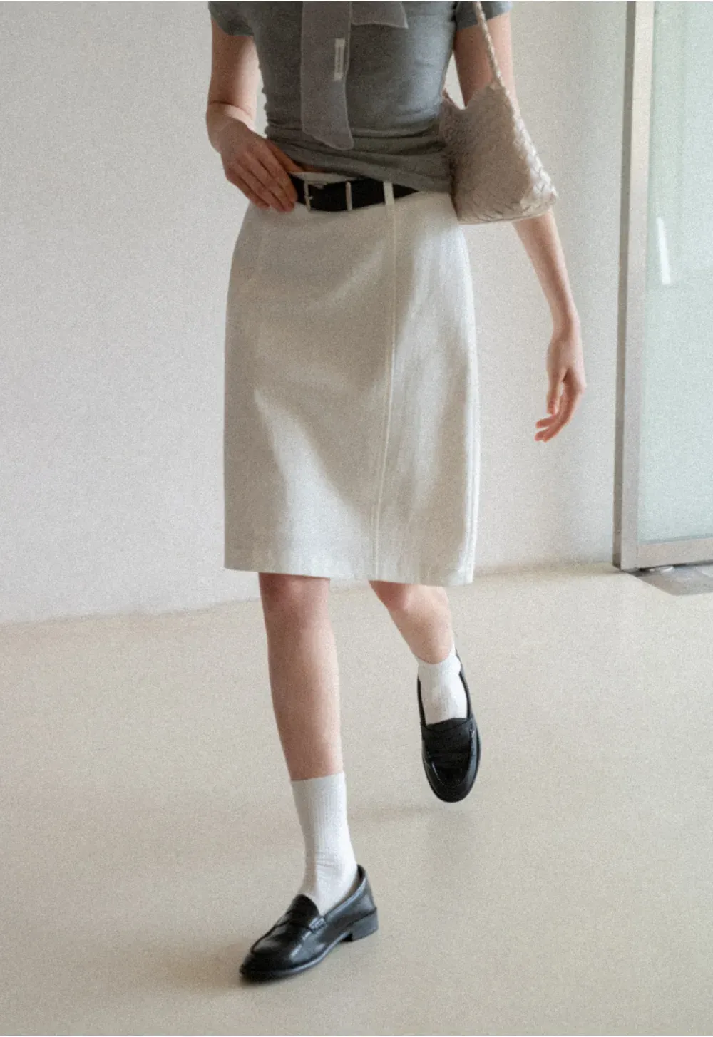 A-line knee length skirt with front seam and belt loop