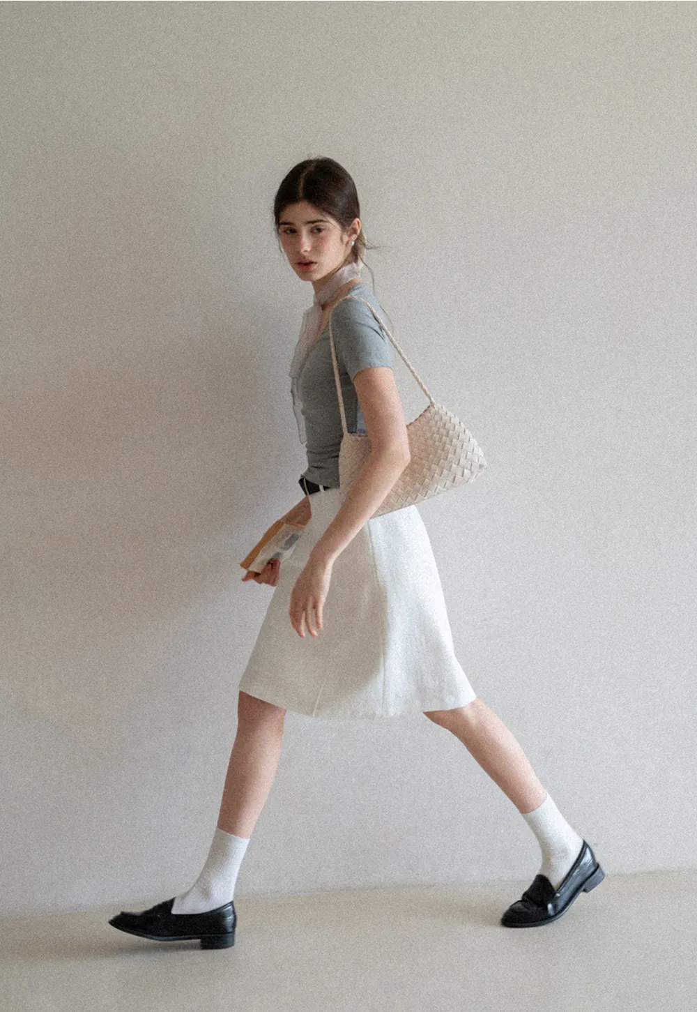 A-line knee length skirt with front seam and belt loop