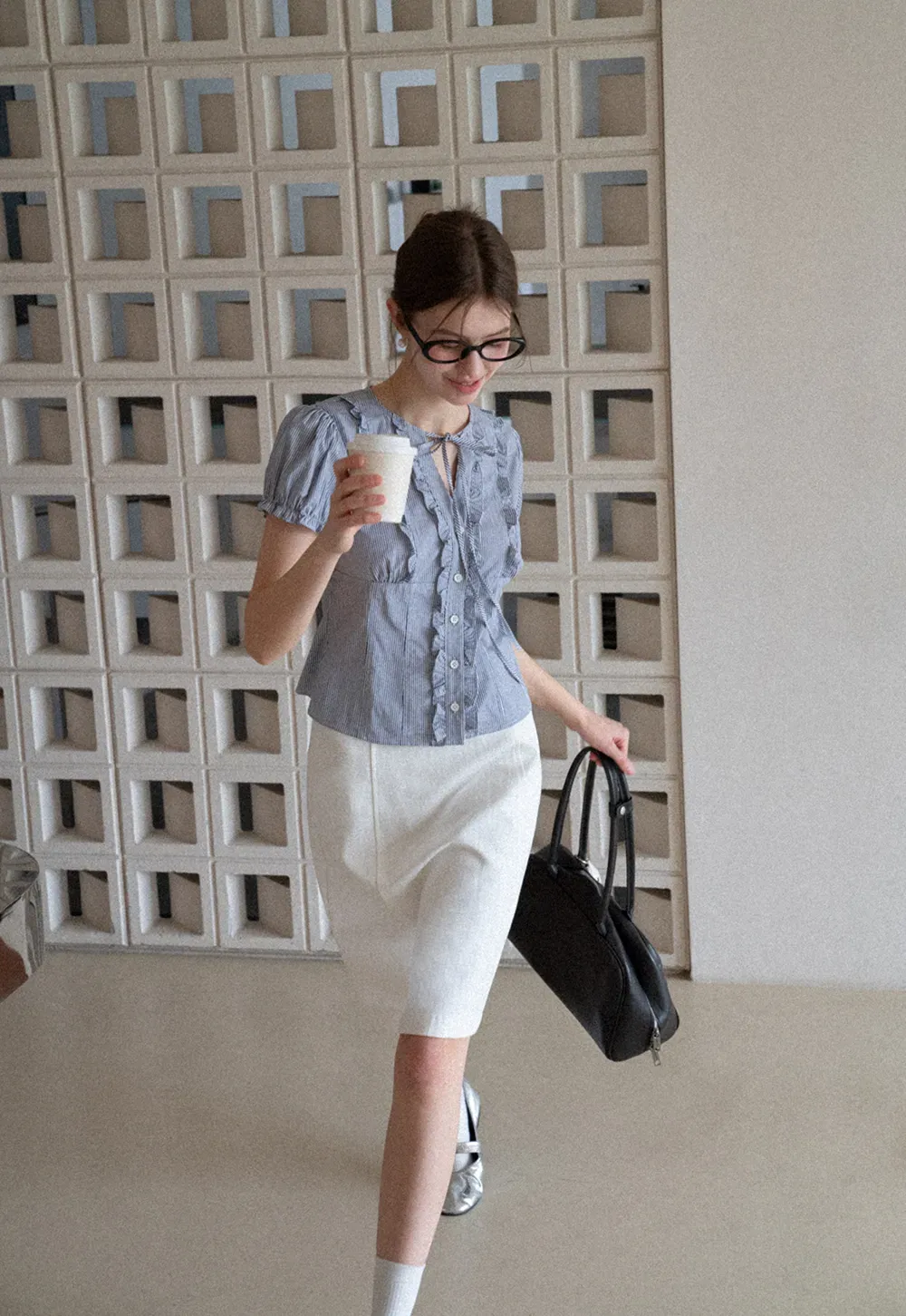 A-line knee length skirt with front seam and belt loop