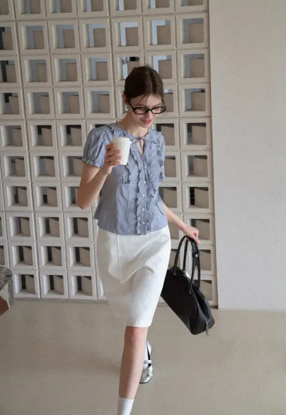 A-line knee length skirt with front seam and belt loop