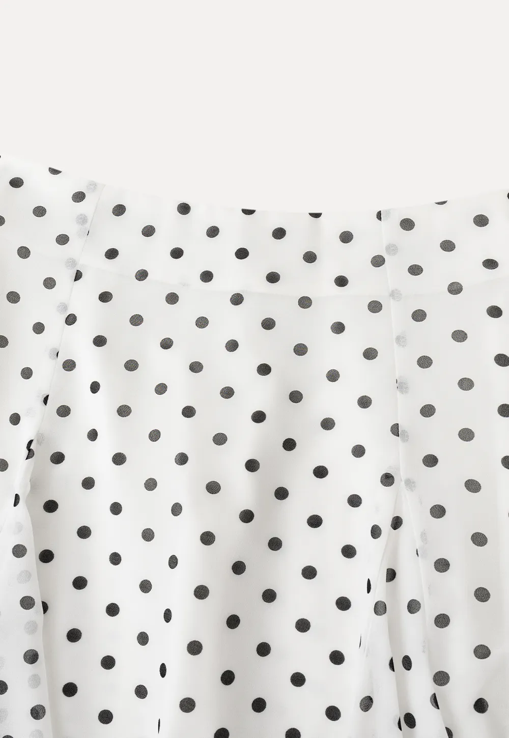 Polka dot pleated asymmetrical skirt