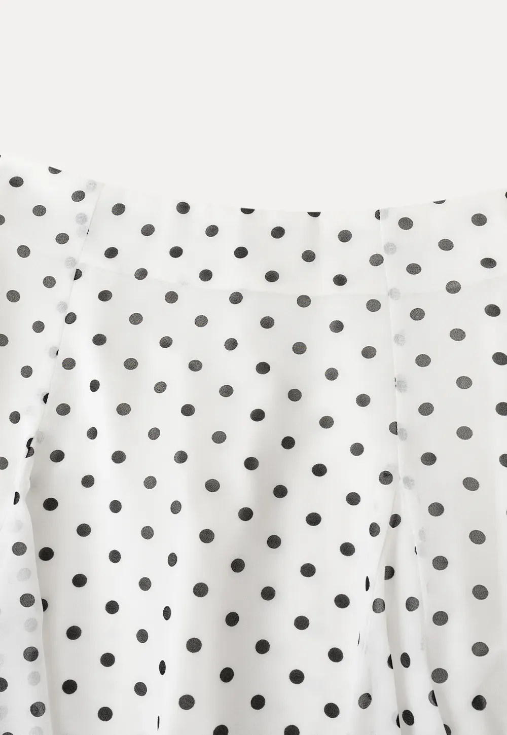 Polka dot pleated asymmetrical skirt