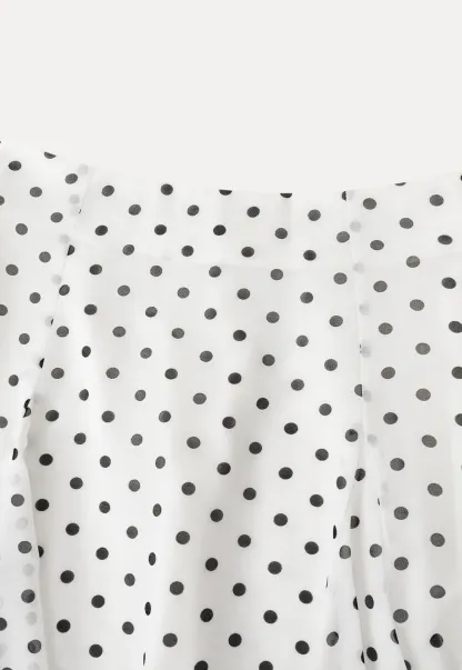 Polka dot pleated asymmetrical skirt