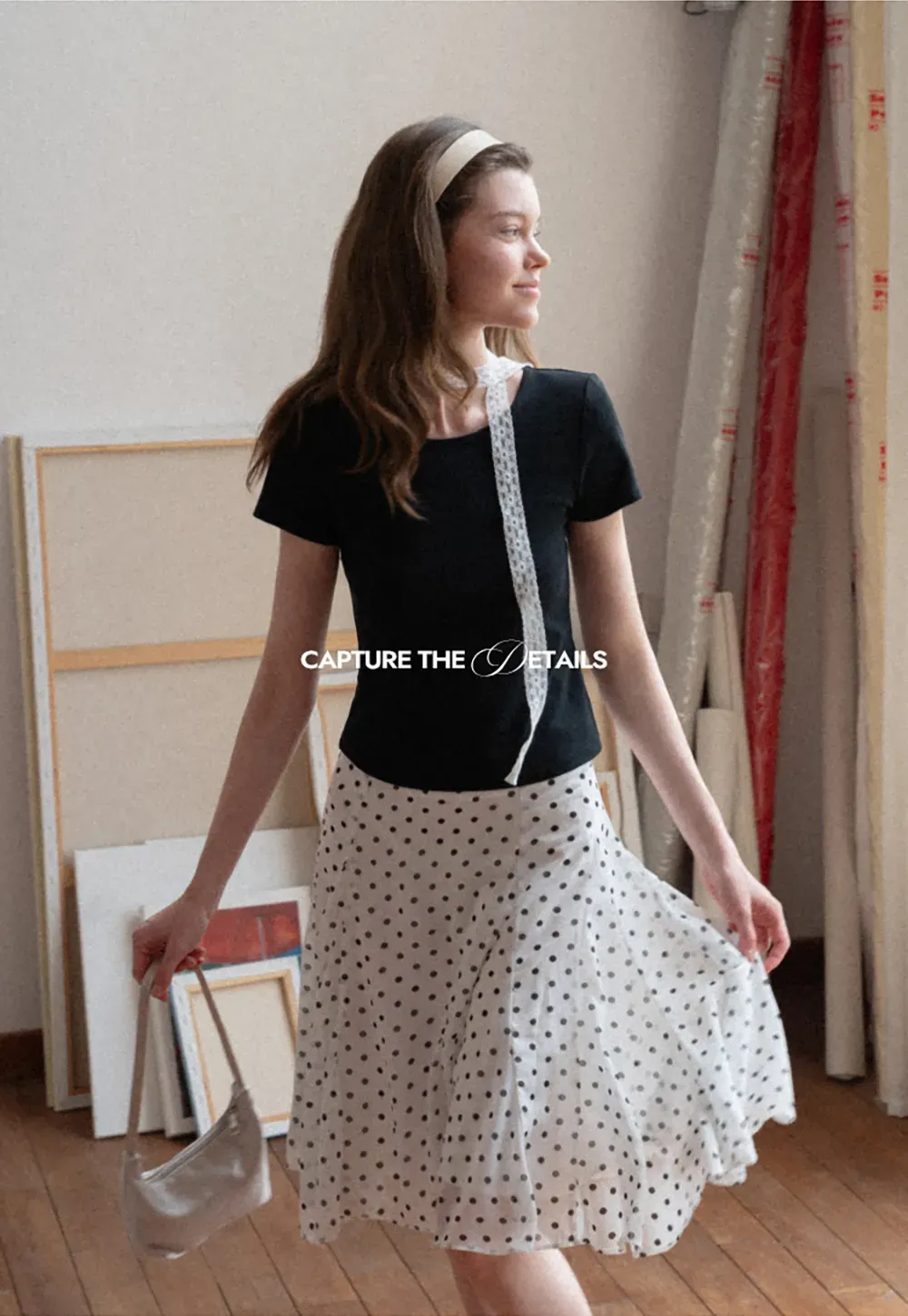 Polka dot pleated asymmetrical skirt