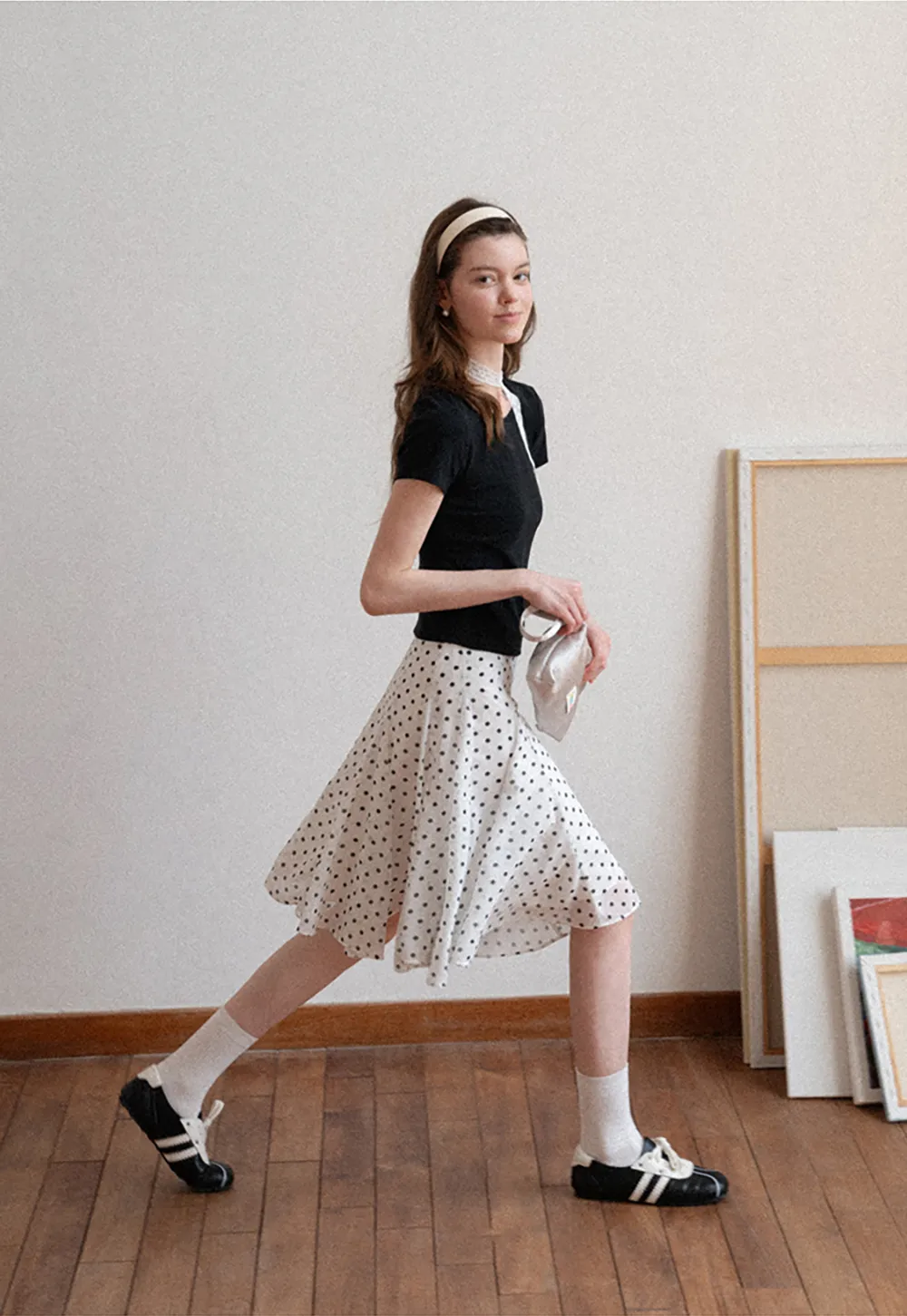 Polka dot pleated asymmetrical skirt