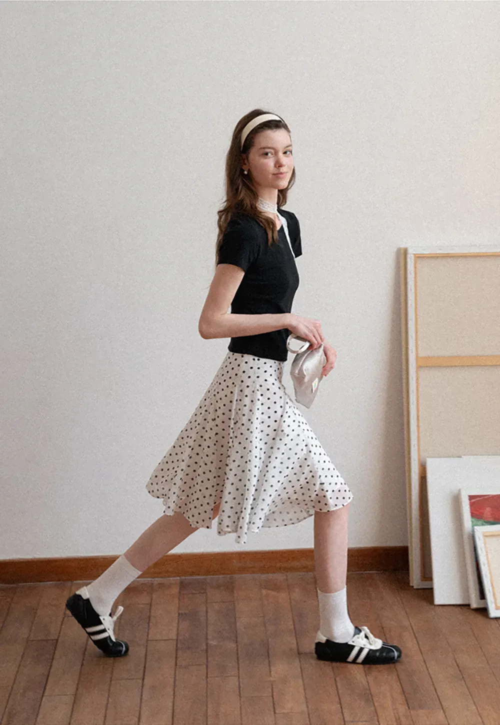 Polka dot pleated asymmetrical skirt