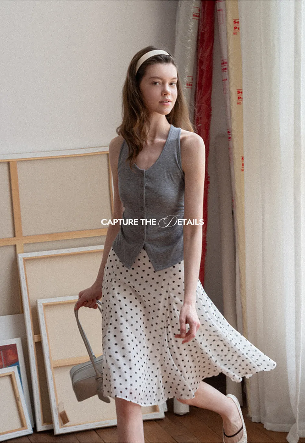 Polka dot pleated asymmetrical skirt