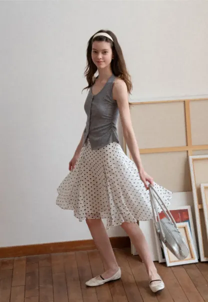 Polka dot pleated asymmetrical skirt